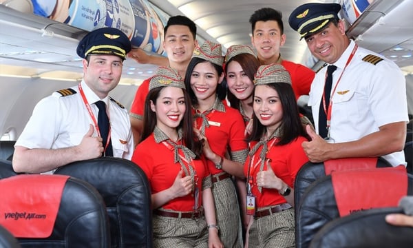 The fun-loving VietJet Air flight crew aboard an airliner.