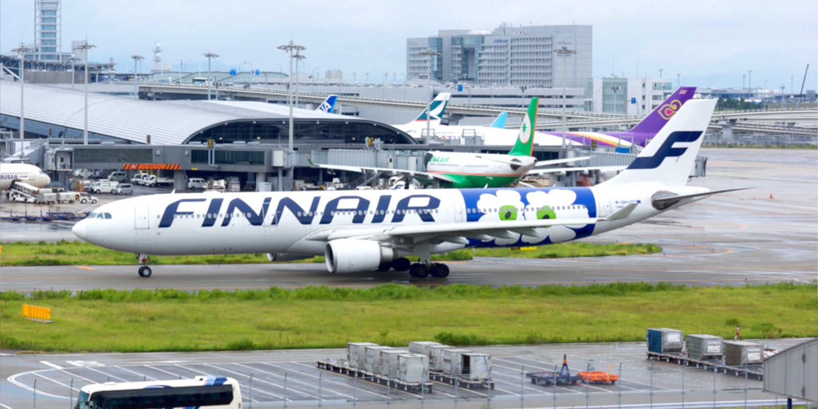 A Finnair airliner resting on the tarmac.